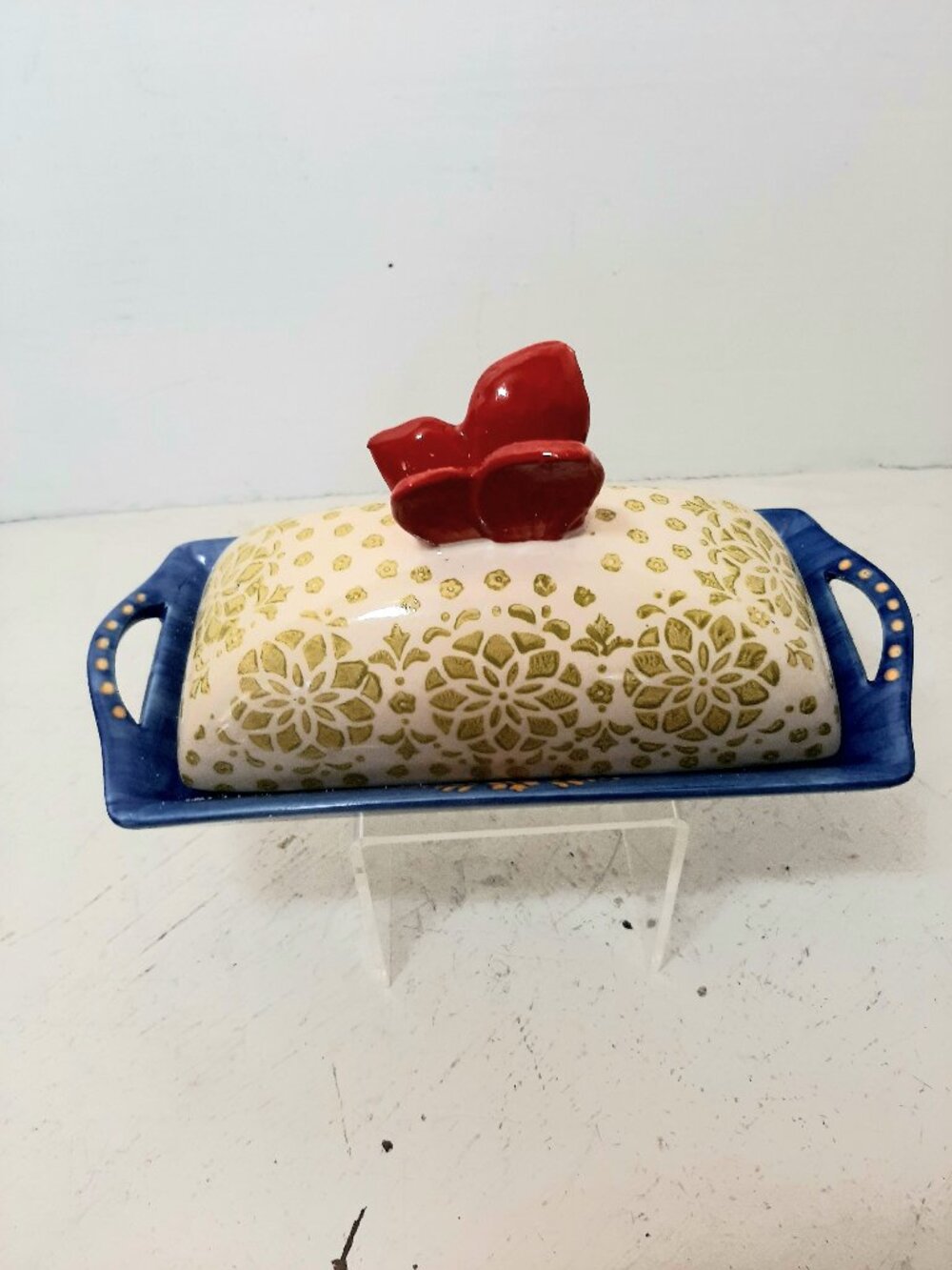 Pier 1 hand painted Stoneware Butter dish. Butterfly finial